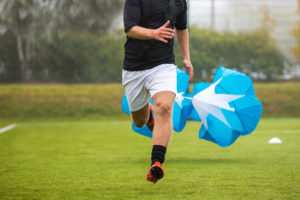 Soccer Football Endurance Training. Speed or Sprint Testing with Parachute. Professional Soccer Strength Test